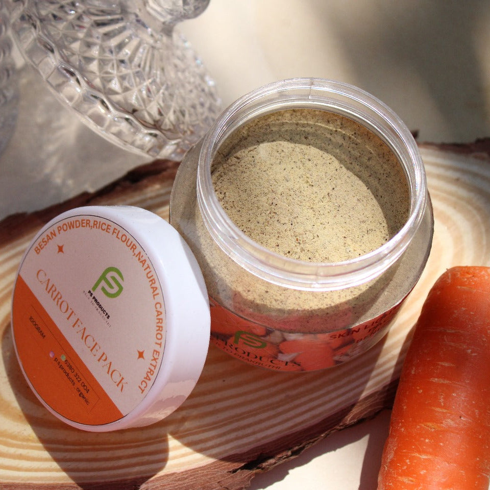 Carrot face pack jar with a carrot and packaging on a wooden surface
