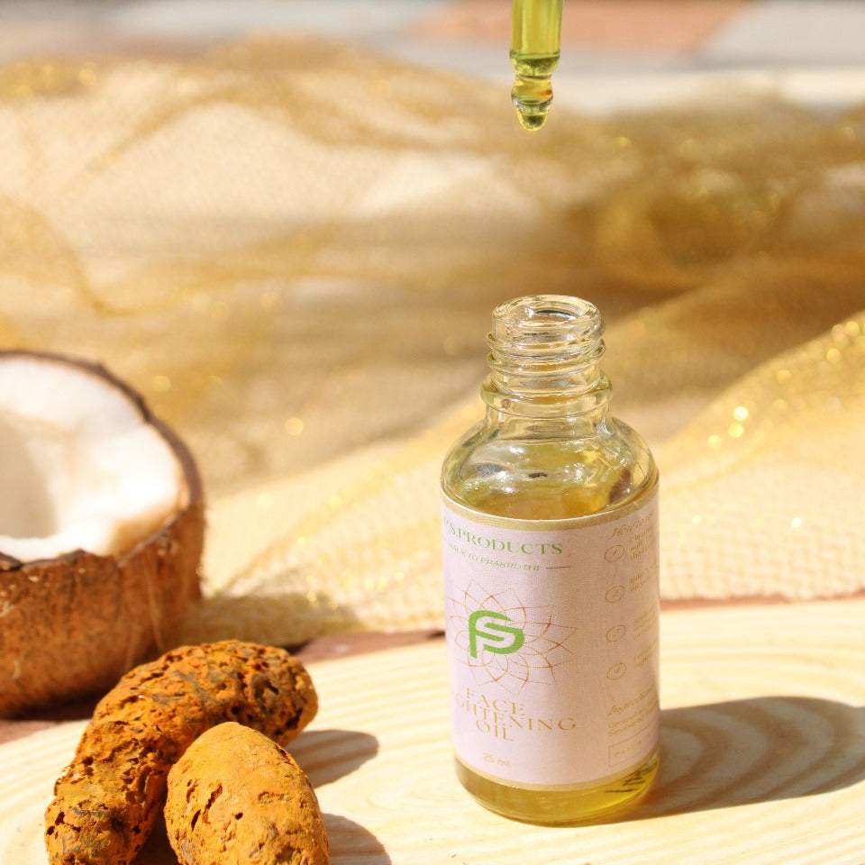 Bottle of oil with a dropper and natural ingredients on a wooden surface